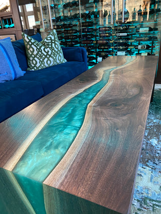 Hand-made wooden coffee table with a blue epoxy resin center